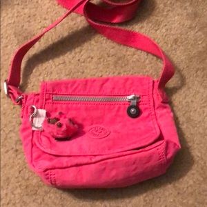 Kipling pink small crossbody purse. New.